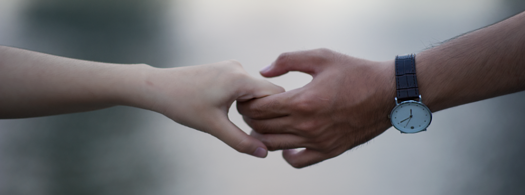 If You’re in Pain, Holding Your Partner’s Hand Can Help