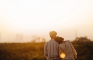 Couple watching the sunset.