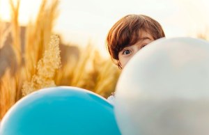 child behind blue and white email