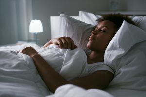 Woman sleeping in bed