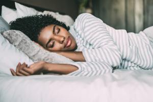 Woman asleep in bed